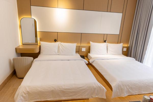 Phòng Deluxe Đôi Với 2 Giường Đôi