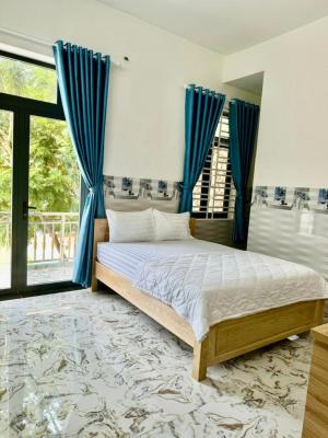 Phòng Deluxe Giường Đôi Có Ban Công