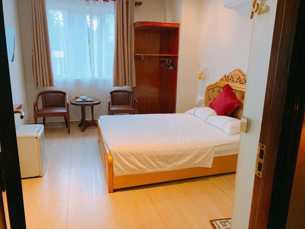 Phòng Giường đôi Deluxe (2 Người lớn + 1 Trẻ em)