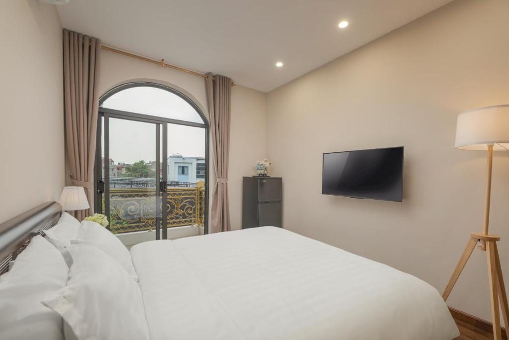 Phòng Deluxe Giường Đôi Có Ban Công