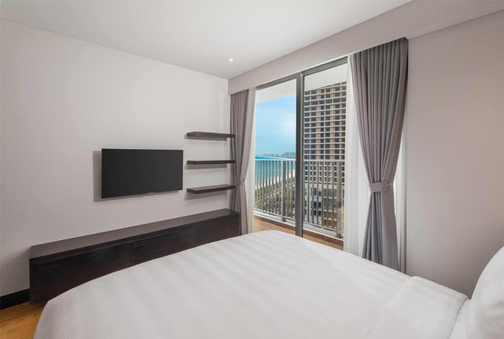 Family One-Bedroom Suite with Balcony and Partial Ocean View
