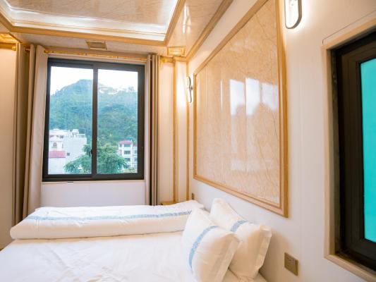 Phòng Giường đôi Deluxe (2 Người lớn + 1 Trẻ em)