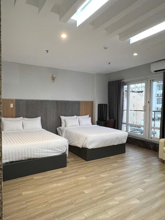 Phòng Deluxe Giường Đôi/2 Giường Đơn Nhìn Ra Thành Phố