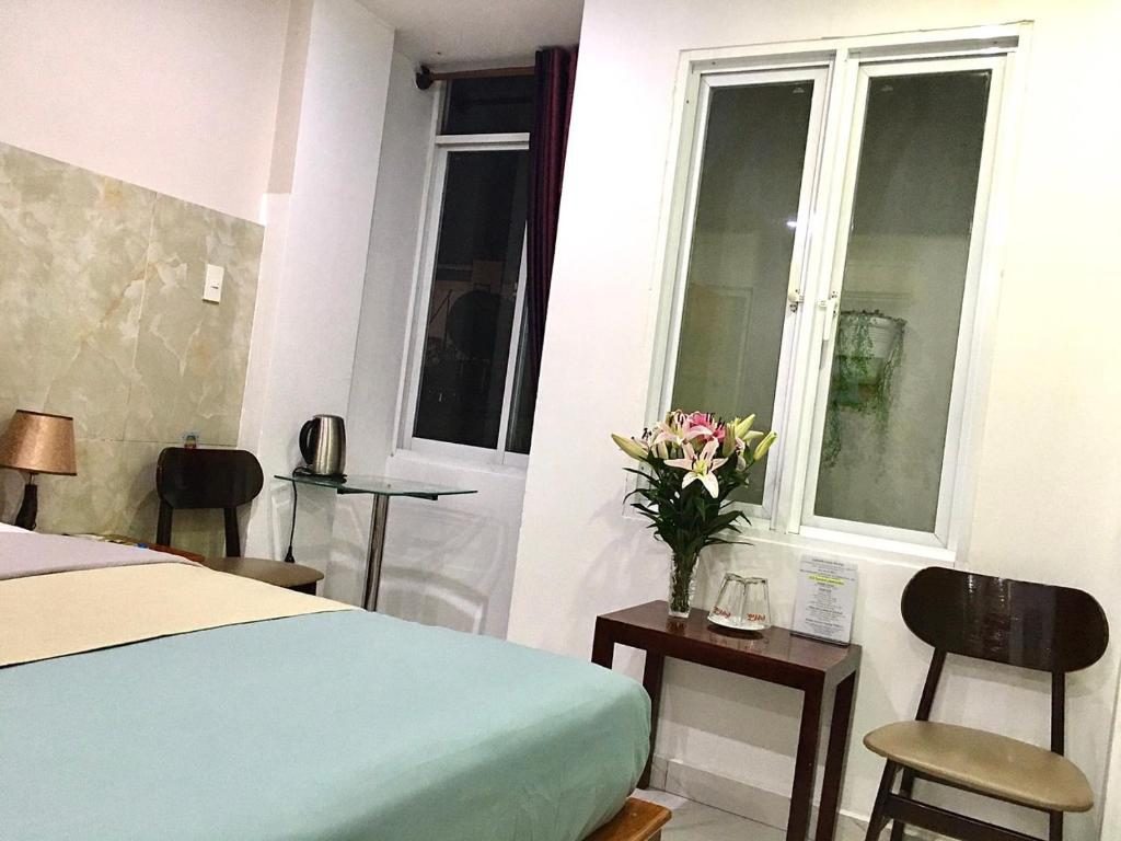 Phòng Deluxe (2 Người lớn + 1 Trẻ em)